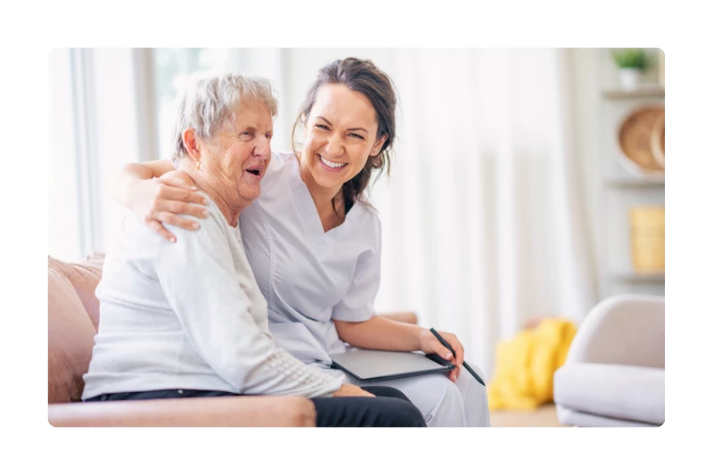 Care home staff with resident